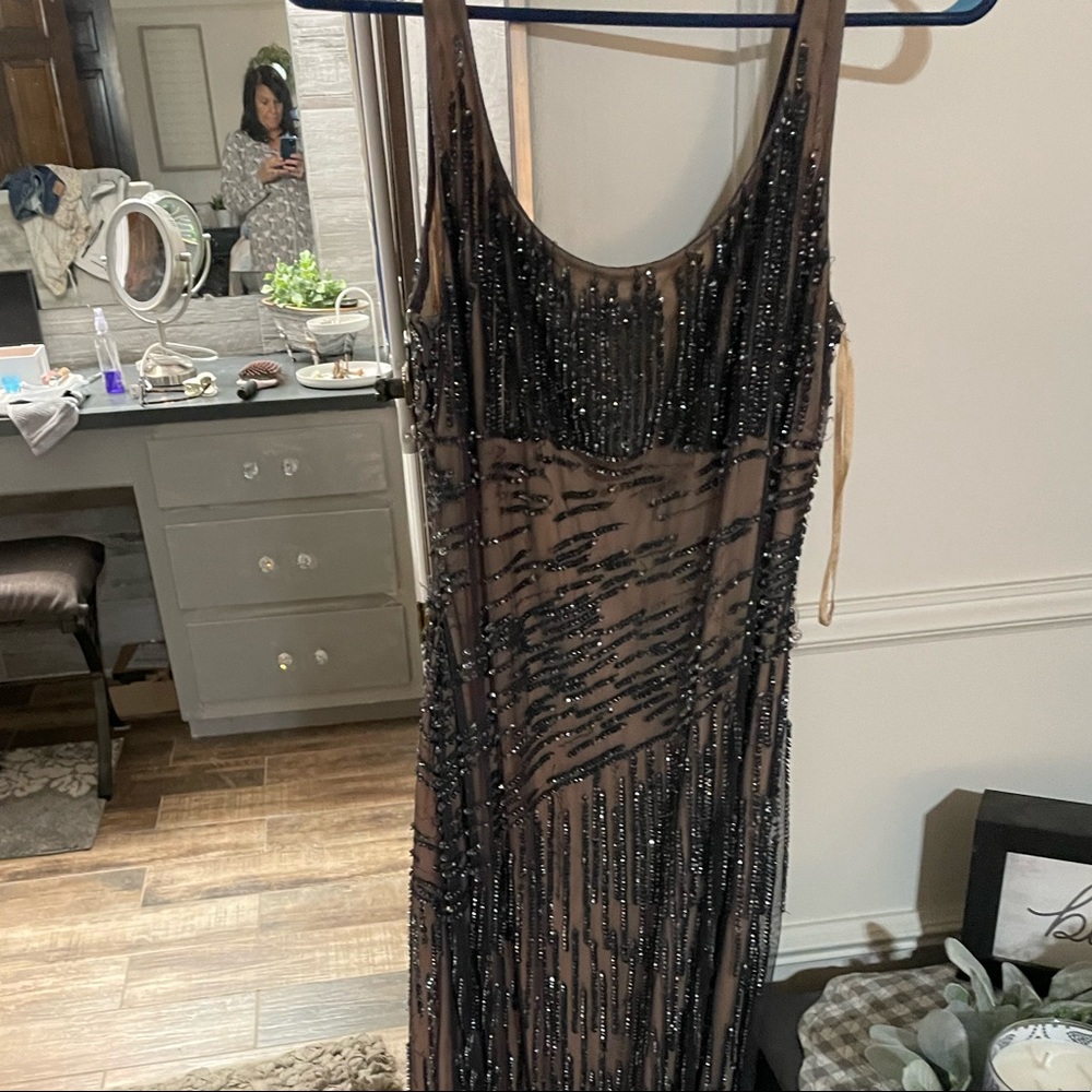 Tags on gown size 10 never worn bought from SAX